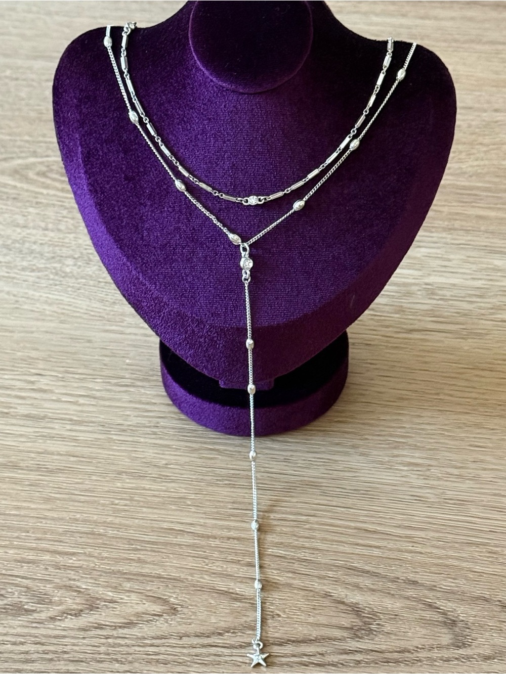 Long lariat necklace with star and rhinestones